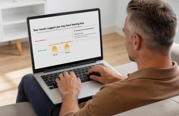 Adult Reviewing Audiogram Results Before Choosing Hearing Support