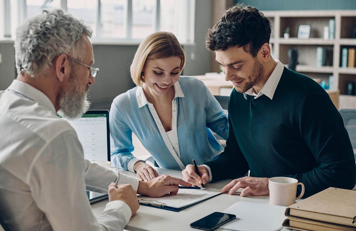 Caregiver Checking OTC Hearing Aid Insurance Benefits Before Buying