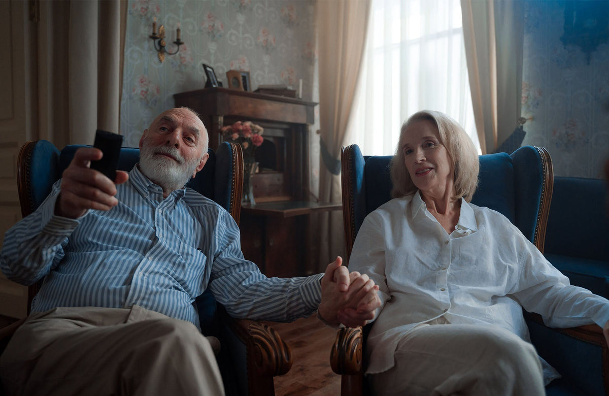 Adult Adjusting TV Audio For Clear Dialogue And Hearing Comfort