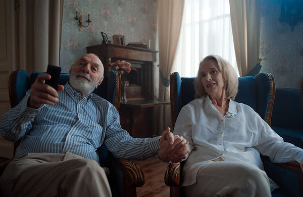 Adult Adjusting TV Audio For Clear Dialogue And Hearing Comfort